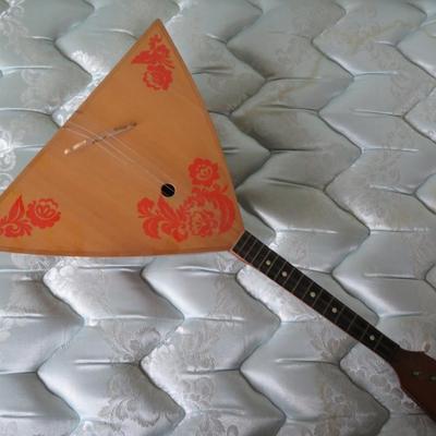 Balalaika. Russian folk instrument. Vintage Russian Balalaika, musical instrument, stringed instrument, Russian Traditional.
