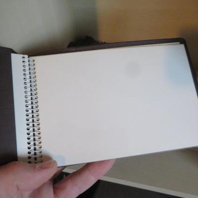 Lot of vintage picture books, and note pat, as seen