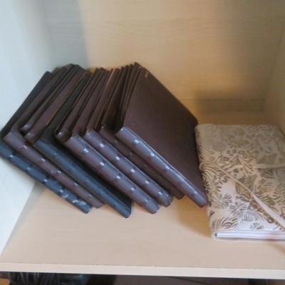 Lot of vintage picture books, and note pat, as seen