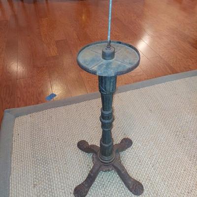 Vintage gumball machine base.