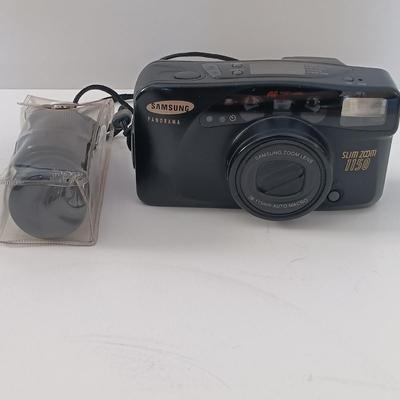 LOT 4L: Sony Handycam HDR-CX240 w/ Nikon Coolpix S4300 and S3000, Vintage Samsung Panorama Camera & More
