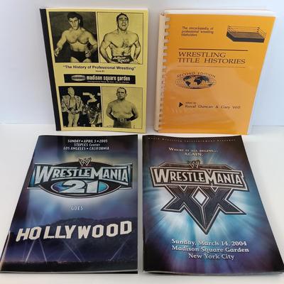 LOT 5L: Wrestling Collection- Several Wrestlemania Booklets Along with Handbound Wrestling Histories and More