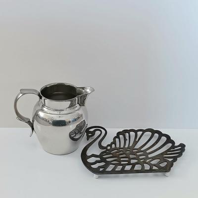 LOT 8L: F.B. Rogers Silverplated Swan Trivet, Trade Continental Handwrought Tray, Williamsburg Stieff Pewter Pitcher & More