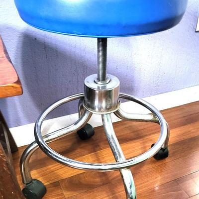 Small Wood Table with Wicker Woven Landry Hamper and Winco Exam Stool