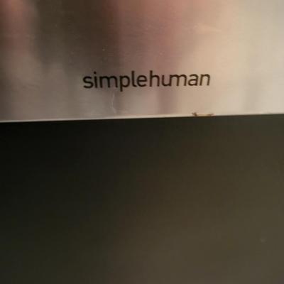 Small White Table with Simplehuman Waste Can, Gray Office Chair and Winco Exam Stool