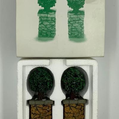 Stone Corner Posts with Holly Tree