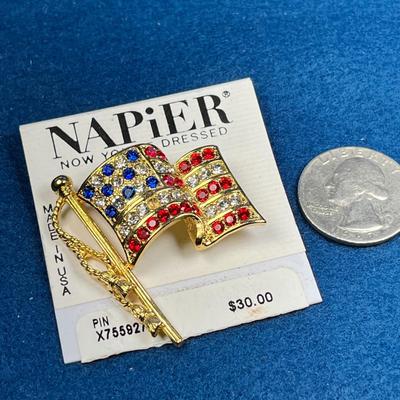 NAPIER GOLDTONE RHINESTONE U.S. FLAG WITH TASSLED ROPE PIN, NEW ON CARD