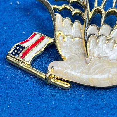 ENAMELED PEACE DOVE CARRYING U.S. FLAG PIN