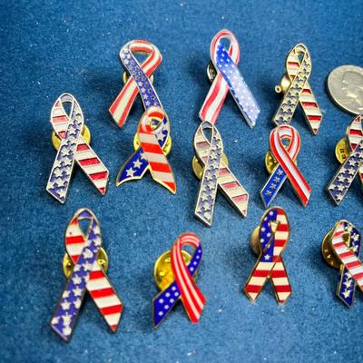 GROUP OF 14 PATRIOTIC RED, WHITE AND BLUE RIBBON SHAPED ENAMELED PINS