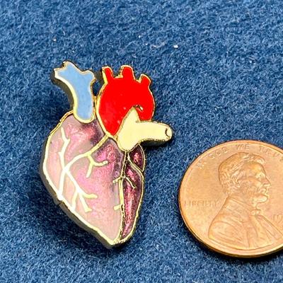 ENAMELED HUMAN HEART PIN