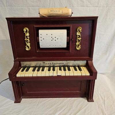 J. Chien Piano Lodeon Player Piano & Two Song Rolls (BD-JS)