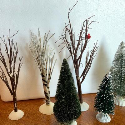 Three Bare Trees, three medium Christmas trees