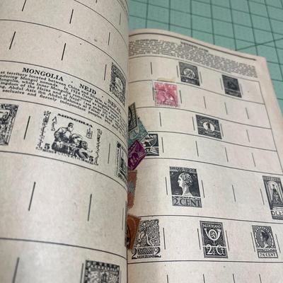 Discoverer Album with Postage Stamps