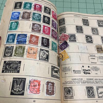 Discoverer Album with Postage Stamps