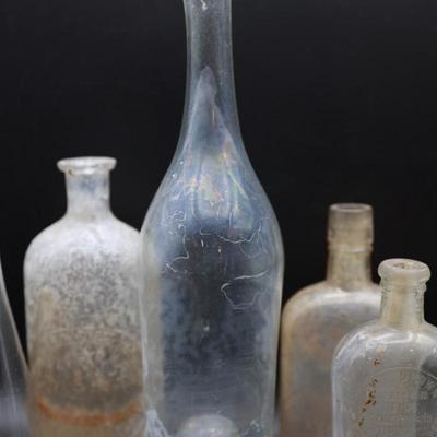 Variety (7) Antique Early Clear Glass Bottles