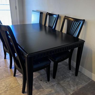 TABLE & 6 CHAIRS. BLACK Metropolitan Style by International Furniture Market 