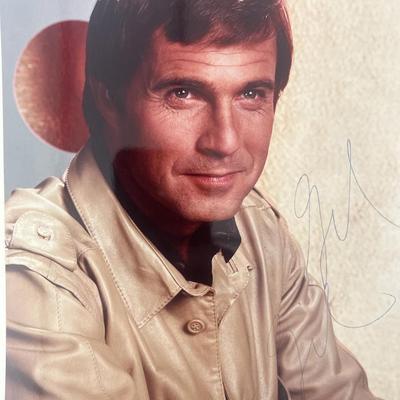 Buck Rogers Gil Gerard signed photo.  GFA Authenticated
