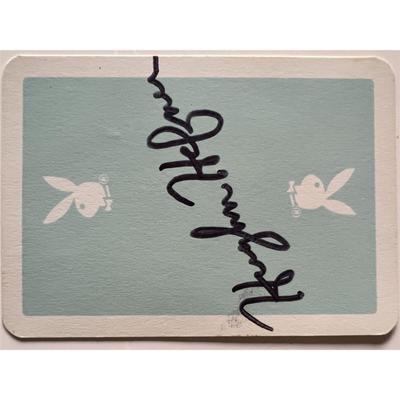 Hugh Hefner signed playing card. GFA authenticated.