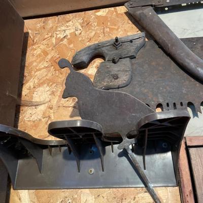 Vintage saws and bird metal stand