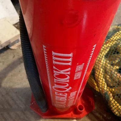 Red bin with items, pump & rope