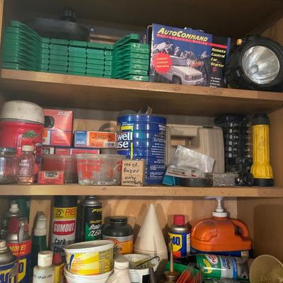 Garage items in cupboard