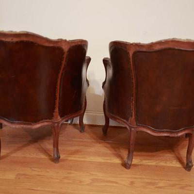 Two Antique Project Leather Embossed Chairs (see description)