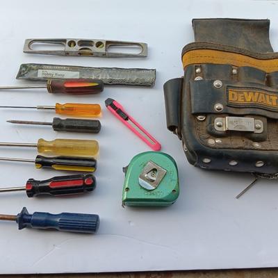 Dewalt tool bag with an assortment of hand tools - screwdrivers and more