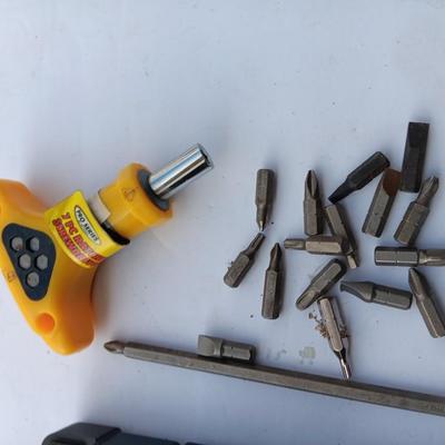 Assortment of Craftsman Driver bits and other brand bits and a driver