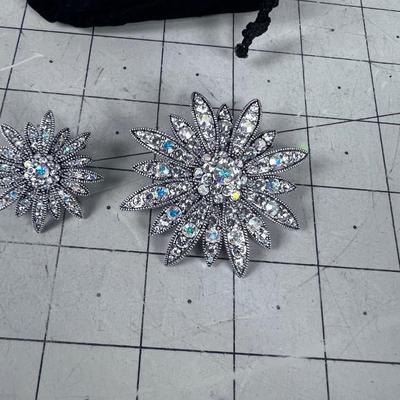2 Different Sized Silver Toned Crystal Floral Brooch