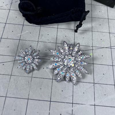 2 Different Sized Silver Toned Crystal Floral Brooch