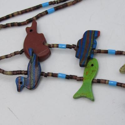 Assorted animal fetish necklace with turquoise thunderbird, bear, fish, turtle, etc