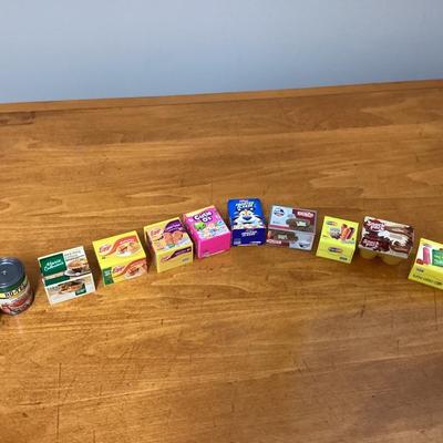 Lot of 12 Shopkins real littles. Figures are in containers