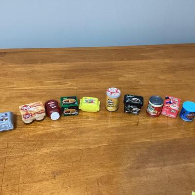 Lot of 12 Shopkins real littles. Figures are in containers