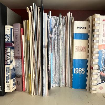 Shelf of books & brochurs