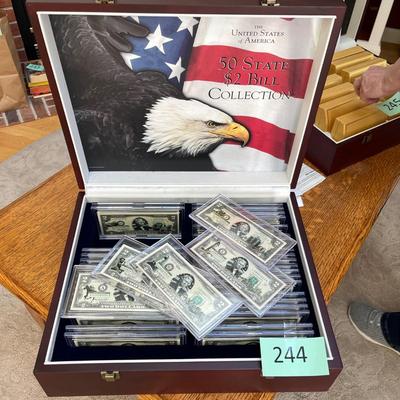 Money! Box of $2 State bills.