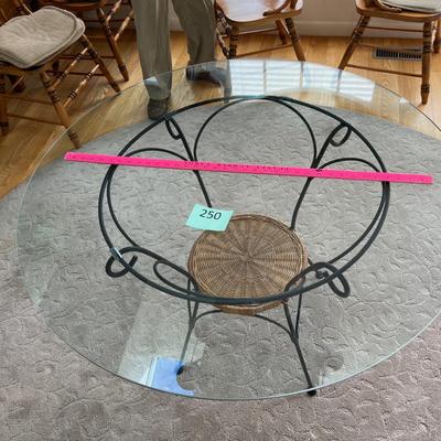 Glass top wrought iron table