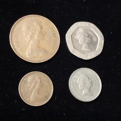 4 FOREIGN COINS