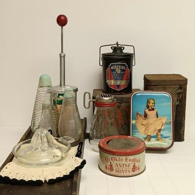 LOT:8: Vintage Vintage Kitchen Collectables Including Tins, Bottles, Crock, Juicer, Chopper Slicer and More