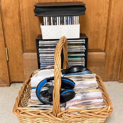 LOT 17: Large Collection of CD's, DVD's, 45's and Headphones
