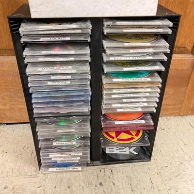 LOT 17: Large Collection of CD's, DVD's, 45's and Headphones