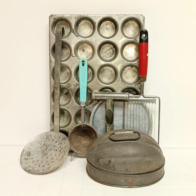 LOT 101B: Vintage Kitchenware- Pudding Mold, Wood-Handled Egg Beater, Tin Corn & Fish Molds and More