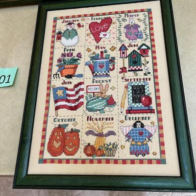 2 framed cross stitch pictures.