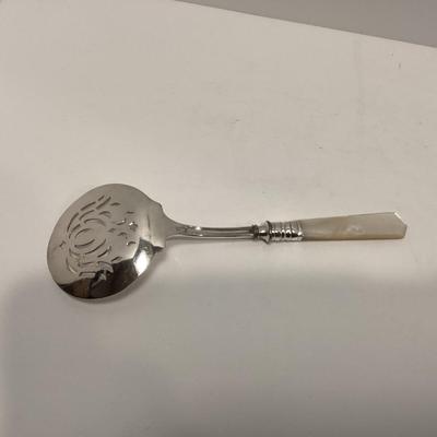 Serving spoon Mother of pearl handle and Sterling Silver band