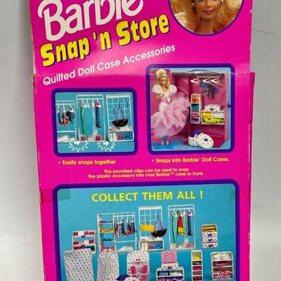 Barbie snap and store new in pkg