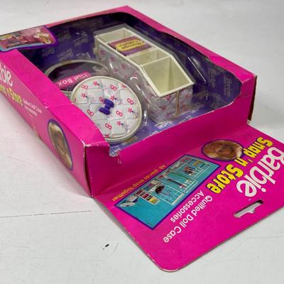 Barbie snap and store new in pkg