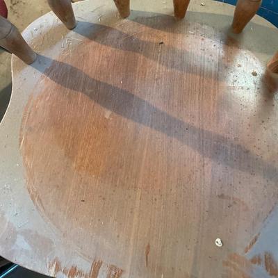 Cord on a large spool & wood swivel stool