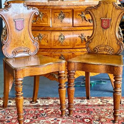 Antique British Oak Heraldic Crested Wood Chairs - a Pair