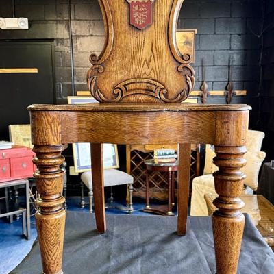 Antique British Oak Heraldic Crested Wood Chairs - a Pair