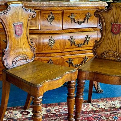Antique British Oak Heraldic Crested Wood Chairs - a Pair