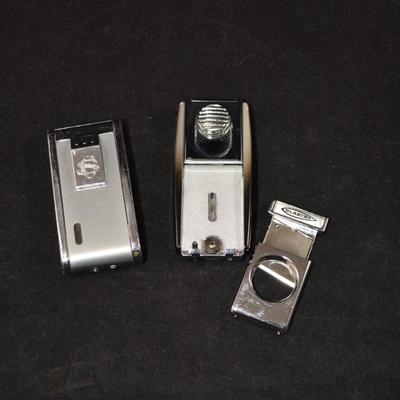 2 Cigar Lighters, One with Cigar Cutter